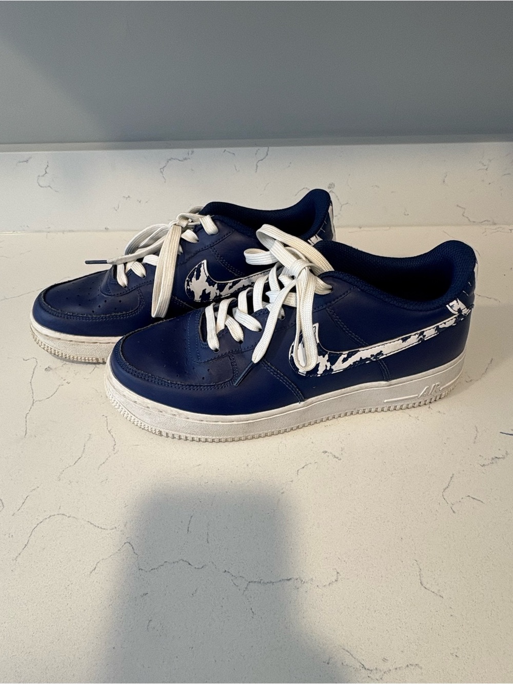 Navy Blue Nike Sneakers with white and navy splash Swoosh Accent